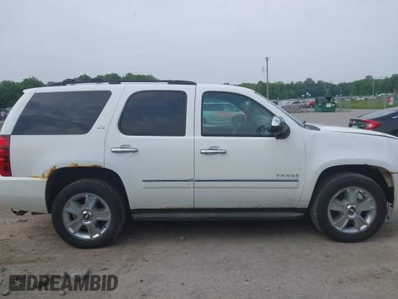 2010 Chevrolet Tahoe LTZ with VIN 1GNUKCE03AR101284, listed as a IAAI auction lot 42489604 with 196,786 mi miles and . Bid and sale history available at DreamBid. Image 13.