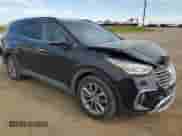 2018 Hyundai Santa Fe SE with VIN KM8SNDHF8JU273400, listed as a Copart auction lot 70684695 with 144,277 mi miles and Salvage title. Bid and sale history available at DreamBid. Image 4.