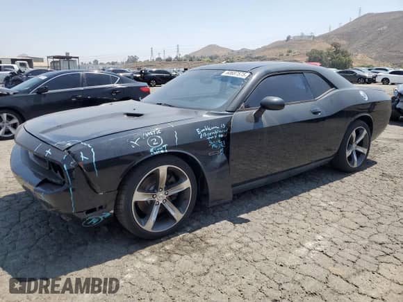 2014 Dodge Challenger R/T Plus with VIN 2C3CDYBT1EH294121, listed as a Copart auction lot 60687575 with 121,607 mi miles and Salvage title. Bid and sale history available at DreamBid. Image 1.