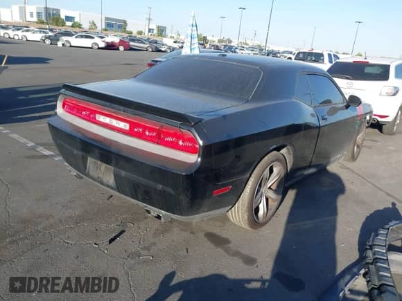 2014 Dodge Challenger R/T с VIN 2C3CDYBT5EH218501, выставлен на аукционе IAAI как лот 42520727 с пробегом 64 210 миль миль и . История ставок и продаж доступна на DreamBid. Изображение 4.