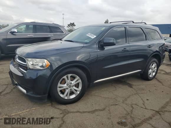 2013 Dodge Durango SXT z VIN 1C4RDJAG8DC665391, wystawiony jako Copart lot #82091615 z przebiegiem 217 229 mil mil oraz Czysty tytuł • Clean title. Historia ofert i sprzedaży dostępna na DreamBid. Obrazek 1.