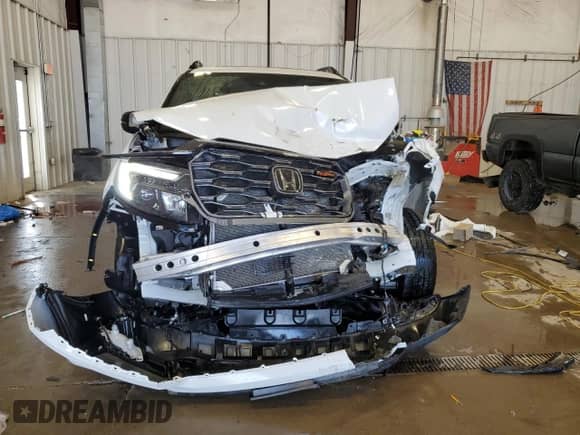 2022 Honda Passport TrailSport с VIN 5FNYF8H6XNB011301, выставлен на аукционе Copart как лот 67362075 с пробегом 36 327 миль миль и На запчасти • Non repairable. История ставок и продаж доступна на DreamBid. Изображение 5.