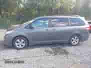 2014 Toyota Sienna LE AAS with VIN 5TDKK3DC0ES414876, listed as a IAAI auction lot 43172800 with 200,070 mi miles and . Bid and sale history available at DreamBid. Image 14.
