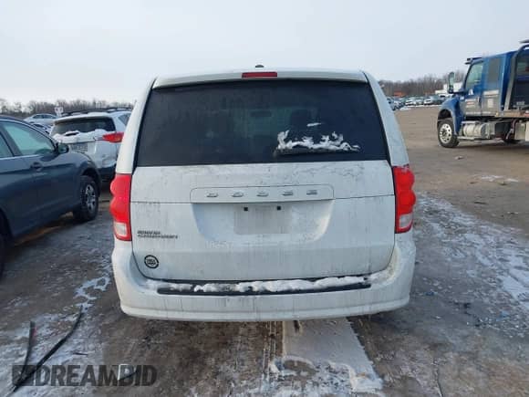 2016 Dodge Grand Caravan SE Plus with VIN 2C4RDGBGXGR170252, listed as a IAAI auction lot 41385171 with 205,424 mi miles and . Bid and sale history available at DreamBid. Image 16.