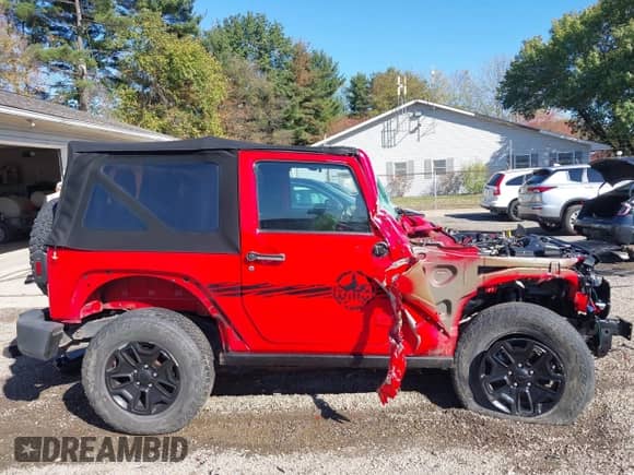 2015 Jeep Wrangler Sport with VIN 1C4AJWAG3FL606500, listed as a IAAI auction lot 40596072 with 110,344 mi miles and . Bid and sale history available at DreamBid. Image 14.