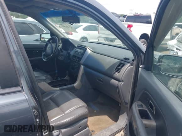 2006 Honda Pilot EX-L z VIN 5FNYF285X6B037032, wystawiony jako IAAI lot #42232591 z przebiegiem 205 551 mil mil oraz . Historia ofert i sprzedaży dostępna na DreamBid. Obrazek 5.