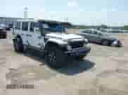 2021 Jeep Wrangler Unlimited Rubicon with VIN 1C4HJXFN0MW648257, listed as a IAAI auction lot 42594545 with 49,410 mi miles and . Bid and sale history available at DreamBid. Image 1.