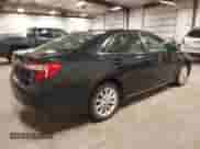 2013 Toyota Camry XLE with VIN 4T1BD1FK5DU097069, listed as a IAAI auction lot 43052279 with 90,257 mi miles and . Bid and sale history available at DreamBid. Image 4.