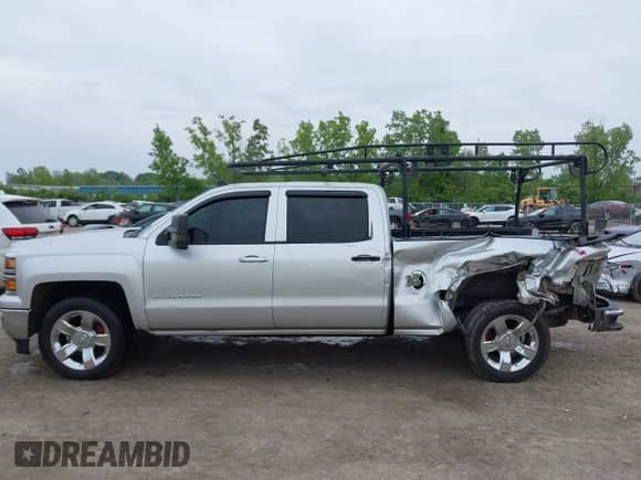 2014 Chevrolet Silverado 1500 LTZ z VIN 3GCUKSEJ9EG510598, wystawiony jako IAAI lot #42383269 z przebiegiem 133 052 mil mil oraz . Historia ofert i sprzedaży dostępna na DreamBid. Obrazek 15.