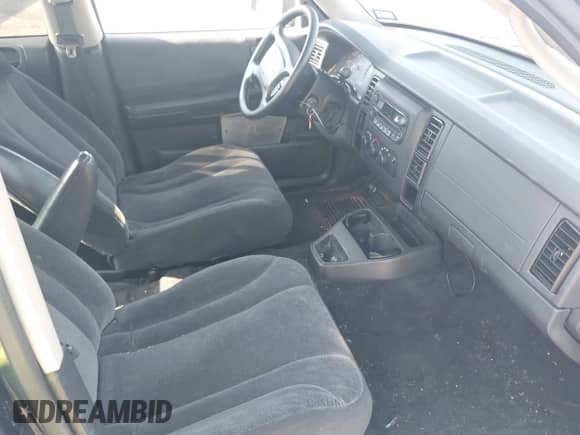 2004 Dodge Dakota SLT with VIN 1D7HL48K74S667977, listed as a IAAI auction lot 42051532 with 92,339 mi miles and . Bid and sale history available at DreamBid. Image 5.