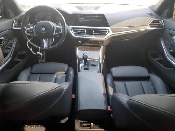 2021 BMW 3 Series 330e xDrive z VIN WBA5P9C00MFJ80209, wystawiony jako Copart lot #66223955 z przebiegiem 131 238 mil mil oraz Szkoda całkowita • Salvage title. Historia ofert i sprzedaży dostępna na DreamBid. Obrazek 8.