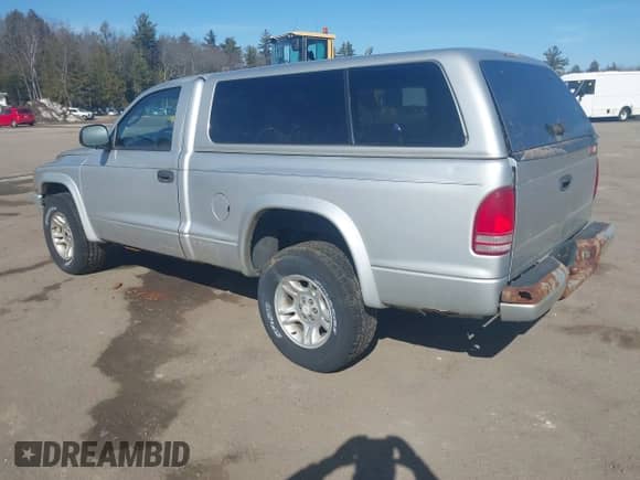 2001 Dodge Dakota with VIN 1B7GG26X31S159885, listed as a IAAI auction lot 41777960 with 91,393 mi miles and . Bid and sale history available at DreamBid. Image 3.