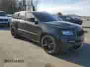 2012 Jeep Grand Cherokee SRT-8 z VIN 1C4RJFDJ3CC152044, wystawiony jako Copart lot #46886435 z przebiegiem 169 619 mil mil oraz Czysty tytuł • Clean title. Historia ofert i sprzedaży dostępna na DreamBid. Obrazek 4.