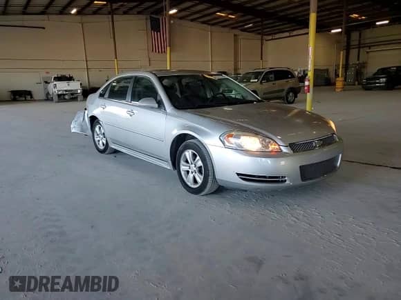 2014 Chevrolet Impala LS z VIN 2G1WA5E39E1177626, wystawiony jako Copart lot #87217745 z przebiegiem 168 136 mil mil oraz Szkoda całkowita • Salvage title. Historia ofert i sprzedaży dostępna na DreamBid. Obrazek 13.