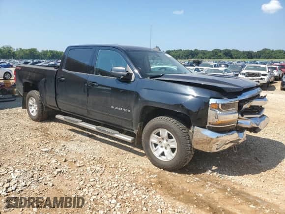 2018 Chevrolet Silverado 1500 LT с VIN 3GCUKREC7JG359703, выставлен на аукционе Copart как лот 69539785 с пробегом 243 935 миль миль и Списание • Salvage title. История ставок и продаж доступна на DreamBid. Изображение 4.
