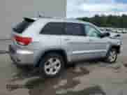 2012 Jeep Grand Cherokee Laredo z VIN 1C4RJEAG7CC236189, wystawiony jako Copart lot #85944985 z przebiegiem Nie podano mil oraz Szkoda całkowita • Salvage title. Historia ofert i sprzedaży dostępna na DreamBid. Obrazek 3.