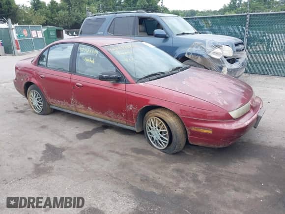 1996 Saturn SL with VIN 1G8ZK5277TZ101040, listed as a IAAI auction lot 42964989 with 151,796 mi miles and . Bid and sale history available at DreamBid. Image 1.