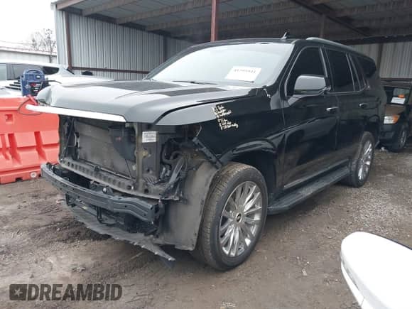 2021 Cadillac Escalade Premium Luxury with VIN 1GYS4BKL9MR247531, listed as a IAAI auction lot 41395941 with 69,650 mi miles and . Bid and sale history available at DreamBid. Image 2.