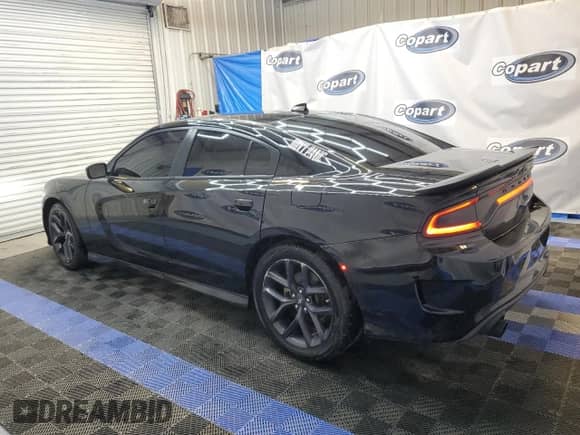2023 Dodge Charger GT with VIN 2C3CDXHG5PH672593, listed as a Copart auction lot 84968995 with 54,379 mi miles and Clean title. Bid and sale history available at DreamBid. Image 2.