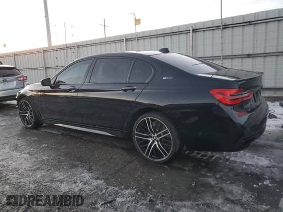 2018 BMW 7 Series 740e xDrive with VIN WBA7J2C59JG938180, listed as a Copart auction lot 85343184 with 35,860 mi miles and Salvage title. Bid and sale history available at DreamBid. Image 2.