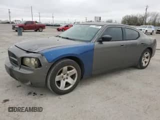 2009 Dodge Charger Police with VIN 2B3KA43V39H567091, listed as a Copart auction lot 51174885 with 171,718 mi miles and Clean title. Bid and sale history available at DreamBid. Image 1.