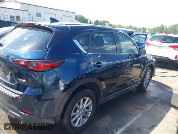 2022 Mazda CX-5 S Select z VIN JM3KFBBM8N0625778, wystawiony jako IAAI lot #42547233 z przebiegiem 34 889 mil mil oraz . Historia ofert i sprzedaży dostępna na DreamBid. Obrazek 4.