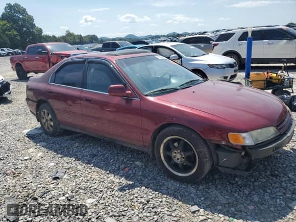 1994 Honda Accord EX с VIN 1HGCD5655RA091390, выставлен на аукционе Copart как лот 71622885 с пробегом 242 076 миль миль и Списание • Salvage title. История ставок и продаж доступна на DreamBid. Изображение 4.