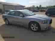 2014 Dodge Charger SE with VIN 2C3CDXBG0EH168331, listed as a Copart auction lot 82185545 with 119,596 mi miles and Salvage title. Bid and sale history available at DreamBid. Image 4.