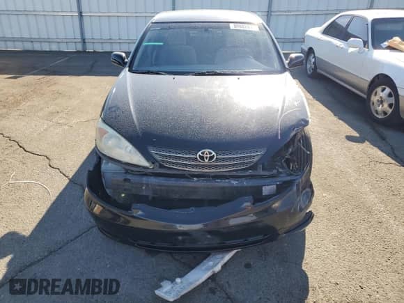 2002 Toyota Camry XLE with VIN 4T1BF30K32U006442, listed as a Copart auction lot 80882015 with 151,964 mi miles and Salvage title. Bid and sale history available at DreamBid. Image 5.