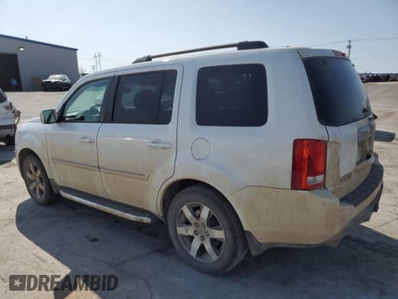 2012 Honda Pilot Touring with VIN 5FNYF3H91CB009155, listed as a Copart auction lot 50989145 with 163,996 mi miles and Salvage title. Bid and sale history available at DreamBid. Image 2.