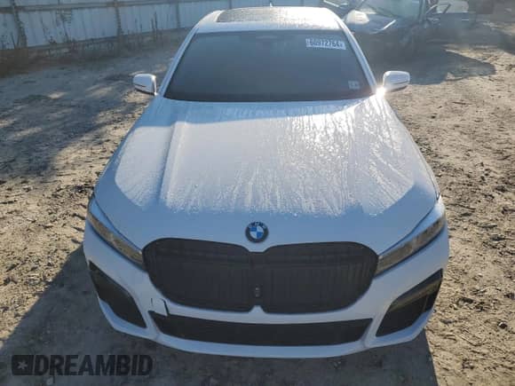 2022 BMW 7 Series 750i xDrive z VIN WBA7U2C00NCG88047, wystawiony jako Copart lot #60972764 z przebiegiem 52 326 mil mil oraz Szkoda całkowita • Salvage title. Historia ofert i sprzedaży dostępna na DreamBid. Obrazek 5.
