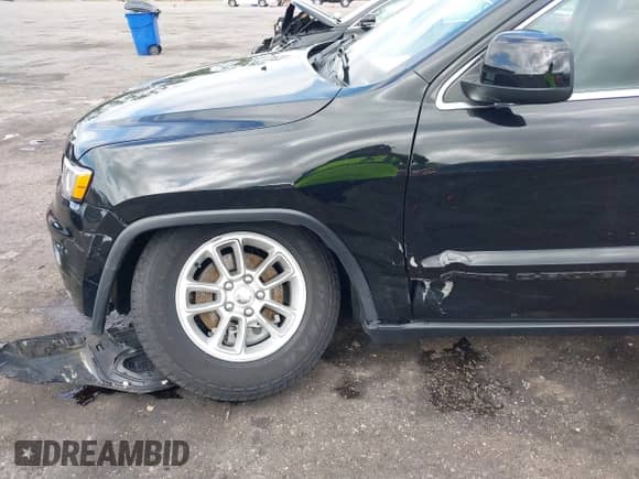 2020 Jeep Grand Cherokee Laredo E with VIN 1C4RJEAG7LC246477, listed as a IAAI auction lot 43113752 with 26,198 mi miles and . Bid and sale history available at DreamBid. Image 6.