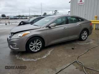 2013 Hyundai Azera с VIN KMHFG4JG0DA288574, выставлен на аукционе Copart как лот 83459544 с пробегом 179 327 миль миль и Списание • Salvage title. История ставок и продаж доступна на DreamBid. Изображение 1.