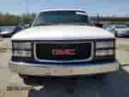 1996 GMC Sierra 1500 с VIN 1GTEC14W2TZ514059, выставлен на аукционе Copart как лот 57124765 с пробегом 179 718 миль миль и Списание • Salvage title. История ставок и продаж доступна на DreamBid. Изображение 5.