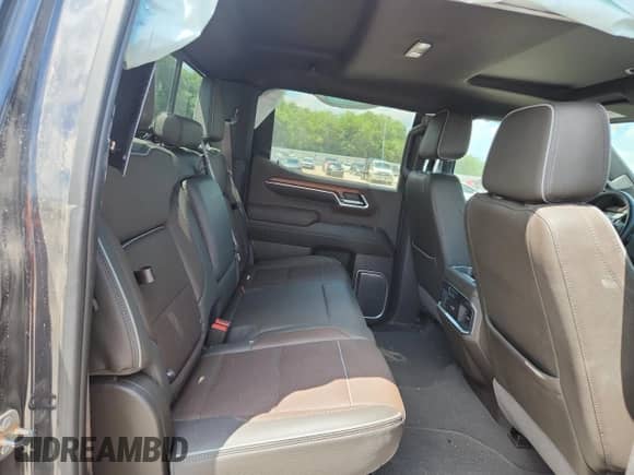 2023 GMC Sierra 1500 Denali with VIN 1GTUUGE88PZ274498, listed as a Copart auction lot 64927885 with 28,326 mi miles and Salvage title. Bid and sale history available at DreamBid. Image 10.