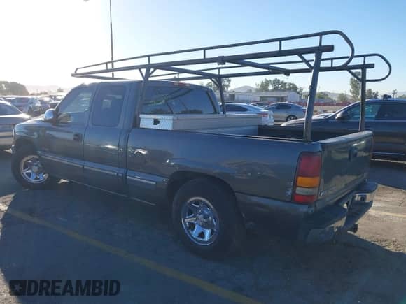 2002 Chevrolet Silverado 1500 LS with VIN 2GCEC19T221179732, listed as a IAAI auction lot 43563008 with 163,536 mi miles and . Bid and sale history available at DreamBid. Image 3.