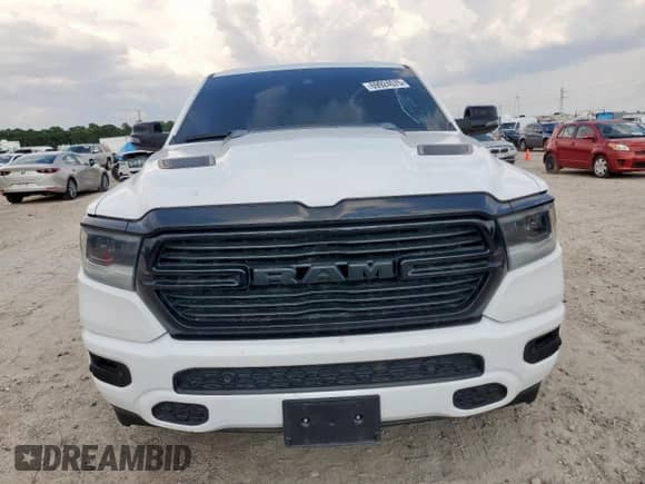 2023 Ram 1500 Laramie z VIN 1C6SRFJT1PN563119, wystawiony jako Copart lot #69924575 z przebiegiem 50 893 mil mil oraz Szkoda całkowita • Salvage title. Historia ofert i sprzedaży dostępna na DreamBid. Obrazek 5.