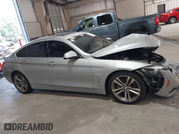 2019 BMW 4 Series 430i with VIN WBA4J1C5XKBM17013, listed as a IAAI auction lot 43272442 with 90,149 mi miles and . Bid and sale history available at DreamBid. Image 14.