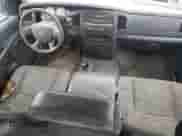 2005 Dodge 1500 SLT z VIN 1D7HU18N95J520489, wystawiony jako Copart lot #82724995 z przebiegiem 151 615 mil mil oraz Czysty tytuł • Clean title. Historia ofert i sprzedaży dostępna na DreamBid. Obrazek 8.