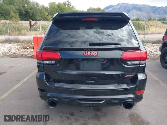 2016 Jeep Grand Cherokee SRT with VIN 1C4RJFDJ7GC399461, listed as a IAAI auction lot 43320500 with 97,123 mi miles and . Bid and sale history available at DreamBid. Image 17.