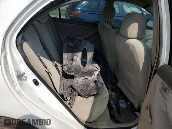 2005 Toyota Corolla CE z VIN 1NXBR32E05Z520462, wystawiony jako Copart lot #63695595 z przebiegiem Nie podano mil oraz Szkoda całkowita • Salvage title. Historia ofert i sprzedaży dostępna na DreamBid. Obrazek 10.