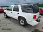 2002 Chevrolet Blazer LS z VIN 1GNDT13W42K206256, wystawiony jako Copart lot #71016145 z przebiegiem 95 775 mil mil oraz Szkoda całkowita • Salvage title. Historia ofert i sprzedaży dostępna na DreamBid. Obrazek 2.