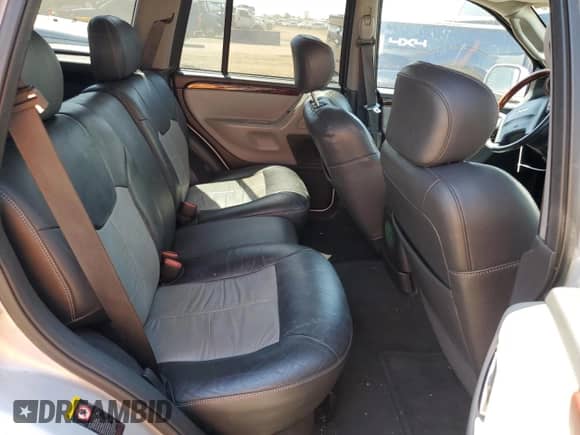 2004 Jeep Grand Cherokee Overland с VIN 1J8GW68J24C399858, выставлен на аукционе Copart как лот 69518935 с пробегом 122 800 миль миль и Чистый • Clean title. История ставок и продаж доступна на DreamBid. Изображение 11.