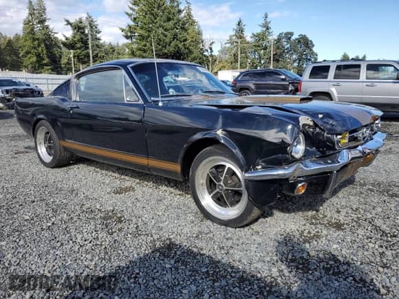 1965 Ford Mustang with VIN 5R09T186141, listed as a Copart auction lot 82097995 with 95,802 mi miles and Salvage title. Bid and sale history available at DreamBid. Image 4.