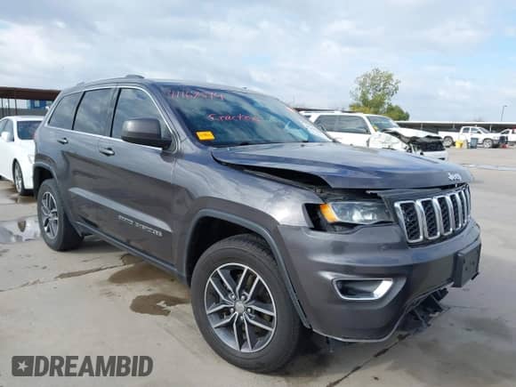 2018 Jeep Grand Cherokee Laredo z VIN 1C4RJEAG7JC450922, wystawiony jako IAAI lot #41169294 z przebiegiem 158 689 mil mil oraz . Historia ofert i sprzedaży dostępna na DreamBid. Obrazek 1.