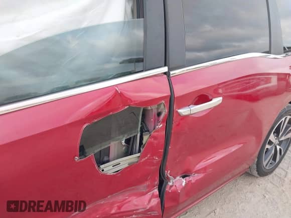 2024 Honda Odyssey Touring z VIN 5FNRL6H82RB040056, wystawiony jako IAAI lot #43286904 z przebiegiem 21 896 mil mil oraz . Historia ofert i sprzedaży dostępna na DreamBid. Obrazek 6.