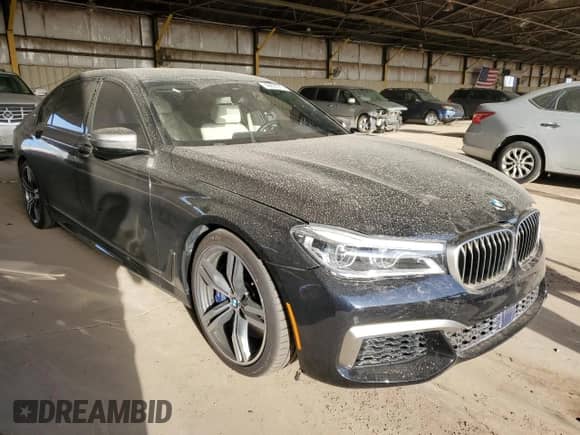 2018 BMW 7 Series M760i xDrive с VIN WBA7H6C57JG614681, выставлен на аукционе Copart как лот 46697275 с пробегом 45 449 миль миль и Списание • Salvage title. История ставок и продаж доступна на DreamBid. Изображение 4.