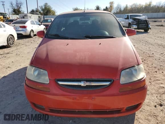 2006 Chevrolet Aveo LS z VIN KL1TD56696B662643, wystawiony jako Copart lot #82846974 z przebiegiem 169 780 mil mil oraz Czysty tytuł • Clean title. Historia ofert i sprzedaży dostępna na DreamBid. Obrazek 5.