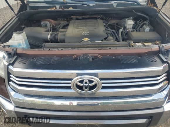 2017 Toyota Tundra Platinum с VIN 5TFAY5F15HX631839, выставлен на аукционе Copart как лот 71710825 с пробегом 106 185 миль миль и Списание • Salvage title. История ставок и продаж доступна на DreamBid. Изображение 11.