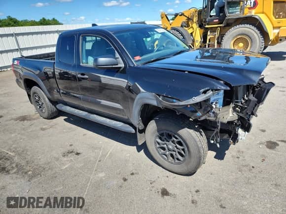 2022 Toyota Tacoma SR z VIN 3TYSZ5AN0NT082424, wystawiony jako Copart lot #65411225 z przebiegiem 22 506 mil mil oraz Szkoda całkowita • Salvage title. Historia ofert i sprzedaży dostępna na DreamBid. Obrazek 4.
